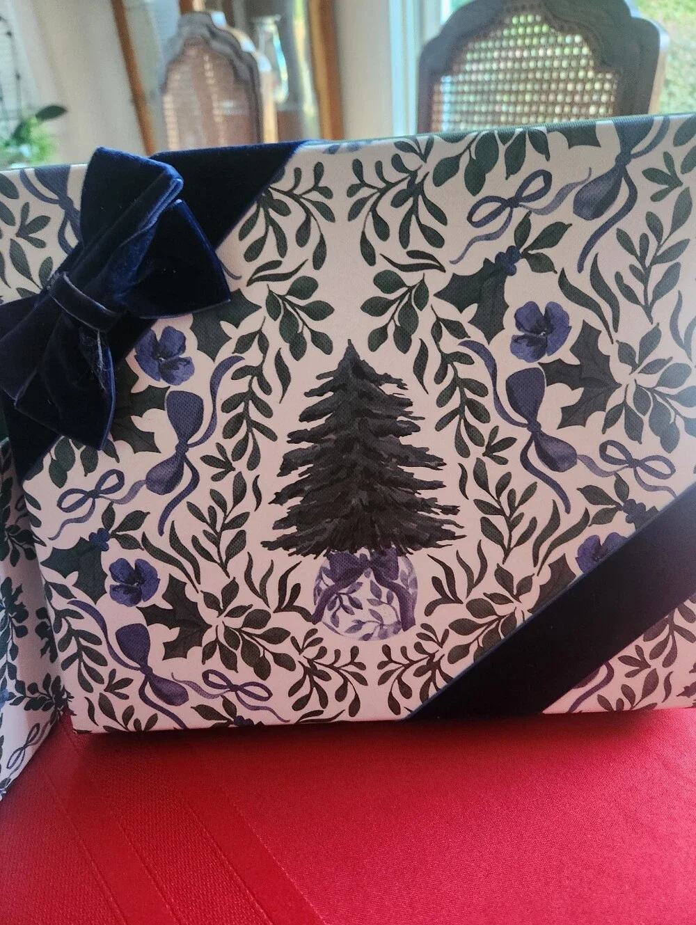 Martha Stewart Christmas gift box with navy and green floral and ribbon design
